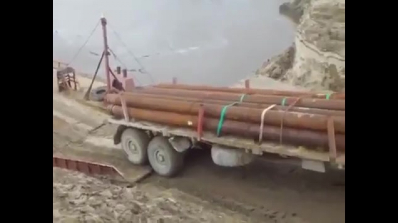 Груженый трубами Урал ушёл под воду